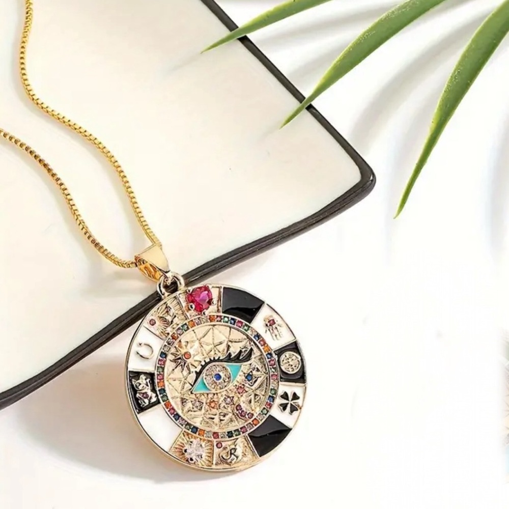 Gold tone Aztec calendar pendant necklace with 18" chain